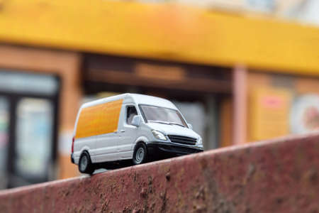 White cargo van. Cargo delivery service. Toy truck van.の写真素材