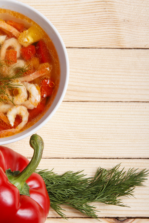 Food background. Dishes of mediterranean cuisine. Soup of fresh, organic vegetables with shrimps. Space for textの写真素材