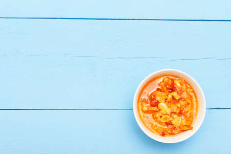 Top view on wooden table with vegetables salad or soup. Blank place for copy space.の写真素材