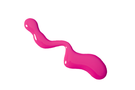 High resolution pink nail polish spill on white backgroundの写真素材