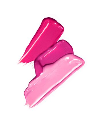Composition of samples of liquid lip gloss isolated on white background. Art of makeup. Face makeup, cosmetics background.の写真素材