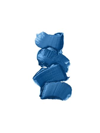 Image of decorative cosmetics samples or makeup strokes in trendy classic blue scheme. Smudged cosmetic products. Trendy deep blue makeup texture, cosmetics concept. Color of the year 2020.の写真素材