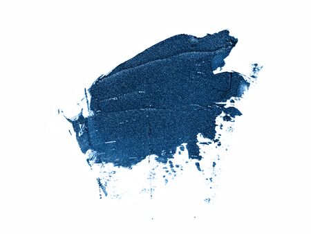 Color of the year 2020 classic blue glitter texture. Sample of classic blue makeup products isolated on white background. Trendy blue makeup, cosmetics concept. Main color trend concept.の写真素材