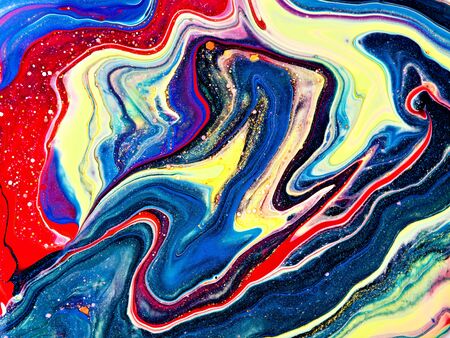 Close-up fragment of acrylic texture with marble pattern. Liquid paint background. Colourful mix of vibrant colours. Abstract art wallpaper.の写真素材