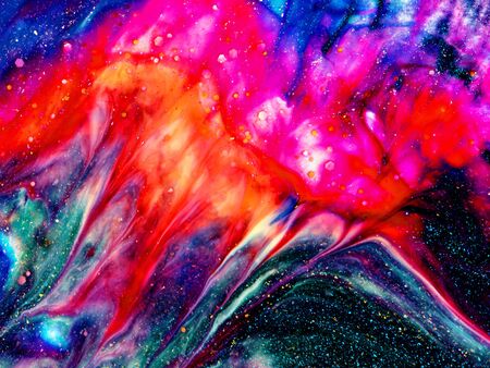 Close-up fragment of nail polish or paint texture with marble pattern. Moody liquid paint background. Mix of vibrant colours. Abstract art wallpaper.の写真素材