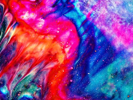 Close-up fragment of nail polish or paint texture with marble pattern. Moody liquid paint background. Mix of vibrant colours. Abstract art wallpaper.の写真素材