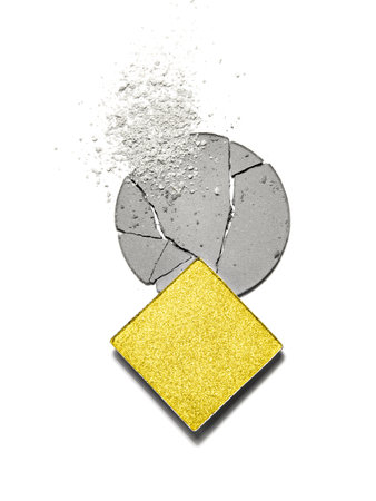 Broken square and round eyeshadows and scattered makeup of main colour trend of the year. Close up of trendy coloured cosmetics. Color of the year 2021illuminating and ultimate gray background.の写真素材