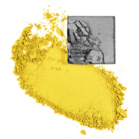 Broken square eyeshadow and scattered makeup of main colour of the year. Close up of trendy toned crushed cosmetics. Color of the year 2021illuminating and ultimate gray background. Main color trend.の写真素材