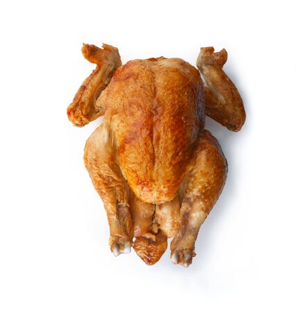 Whole grilled chicken on white background. The file includes a clipping path.  Professionally retouched high quality image.の写真素材