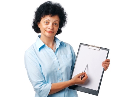 Elder woman holding a clipboard and showing something over white.の写真素材