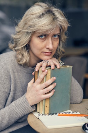 Blue eyed blond beauty thinkingの写真素材