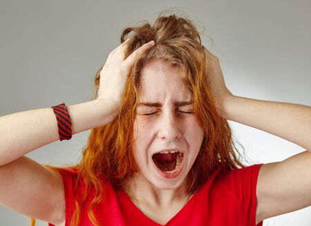 Stressed sad young girlの写真素材