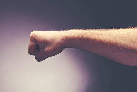 a male fist who wants to hit