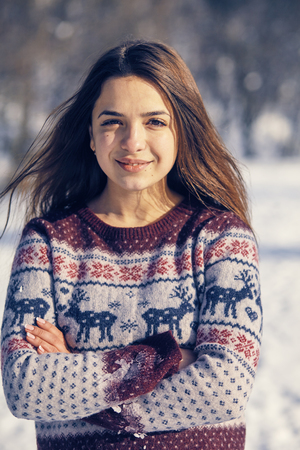 Beautiful young woman in winterの写真素材