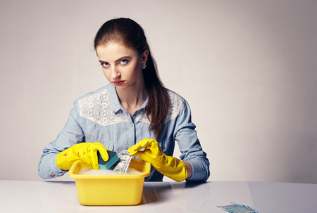 conceptual image on which the woman launder shady moneyの写真素材