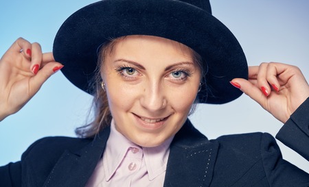 young attractive woman in a hatの写真素材