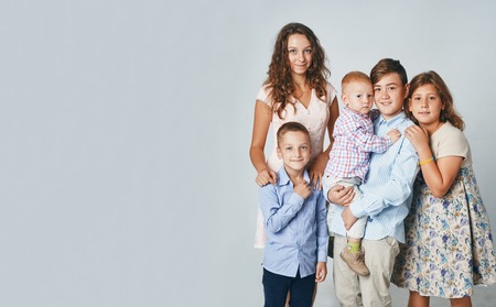studio portrait of happy children of all ages