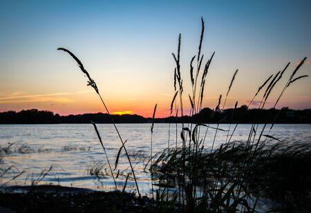 lake with a sunset skyの写真素材