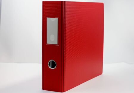 red binder on a white backgroundの写真素材
