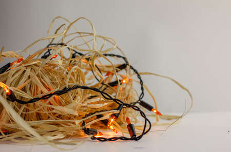 orange lights and raffiaの写真素材