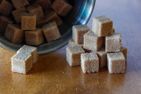 sugar cubes were wood table