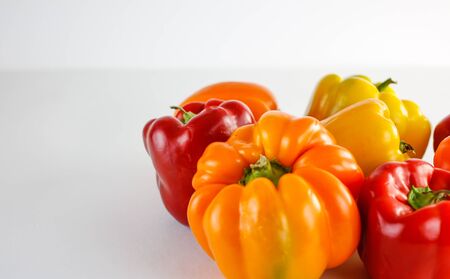 colorful garden peppers on a white backgroundの写真素材
