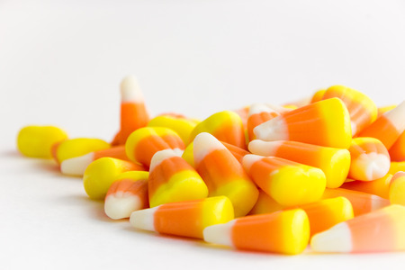 orange, yellow and white Halloween candyの写真素材