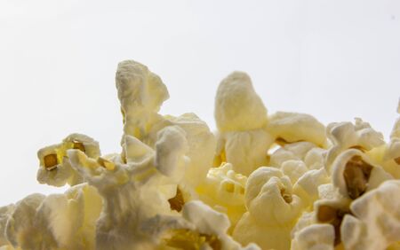 popcorn close up on a white backgroundの写真素材