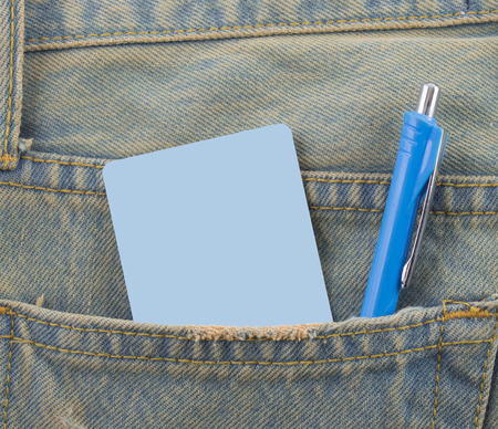 Card in a back pocket of a denim jeans as a backgroundの写真素材