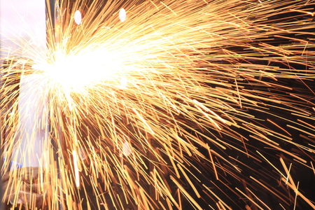 Welder works with a lot of sparkleの写真素材