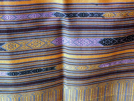 Mid section of a wonderful silk shawl from Laos. The beautiful patterns and subdued colors of a...