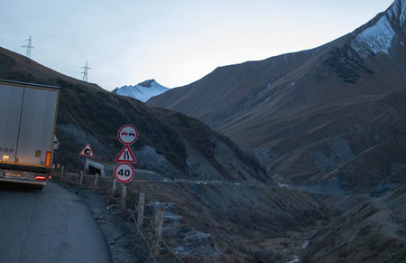 Road among the Caucasus Mountains, Georgian military road, crossing the border between Russia and...