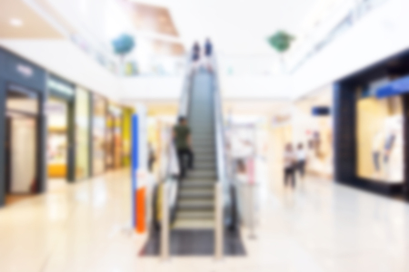 escalator in shopping mall abstract defocused blurred background.
Abstract blur man on escalator in shopping mall interior backgroundの写真素材