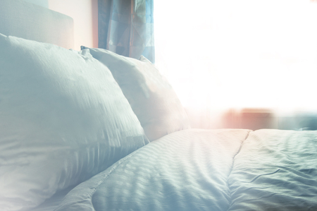 White bedroom interior design. luxury bedroom with soft color tone. modern white color tone bedroom design. の写真素材