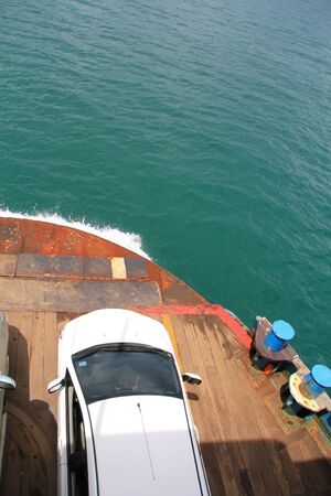 A white car on the ferry の写真素材