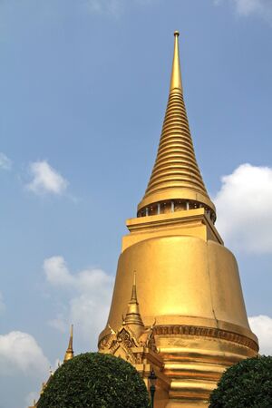A golden Sri Lankan styled pagoda at the grand palace, Bangkok, Thailandの写真素材