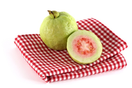 Closeup tropical fruit photo : Fresh Pink Apple Guava on a Checkered table clothの写真素材