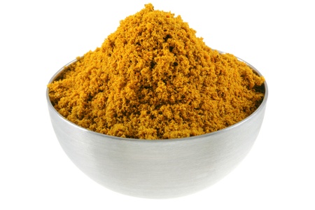 A bowl of spicy Curry Powder, main ingredient to cook Asian curryの写真素材