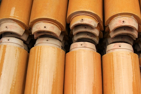 Pieces of Yellow Chinese-styled Glazed Roof Tiles の写真素材