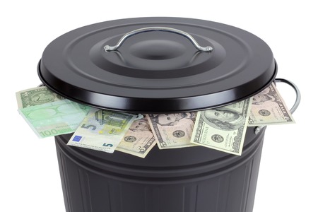 Euro and Dollar banknotes in a trash canの写真素材