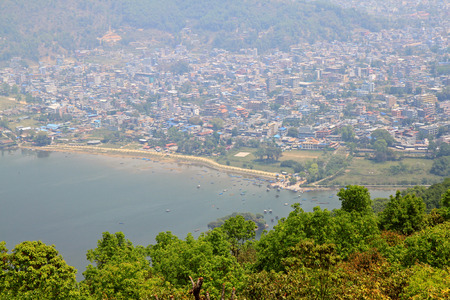 View of Pokhara city at foot of Annapurna range along the Phewa Lake in Pokhara city, Nepal. Photo taken from Ananda Hill, World Peace Pagodaのeditorial素材