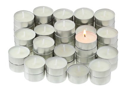 A group of Tea lights isolated on white backgroundの写真素材