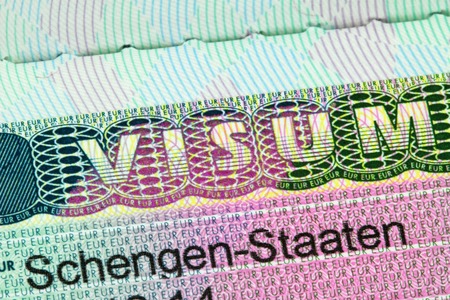 Closeup of the Schengen visa to Austria Germany with shallow DOF focusing on the word VISUMの写真素材