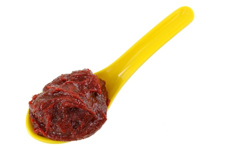 A spoon of Korean fermented red hot pepper paste Gochujangの写真素材