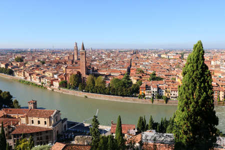 View of Verona skyline Church of Santa Anastasia the Lamberti Tower River Adige in Verona Italy seen from Castell San Pietroの写真素材