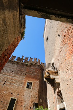 A Balcony and parts of old brick Castle Fortress Castelvecchio in Verona, northern Italy on September 14, 2014. Castelvecchio was built in 1354 by the Scaliger Cangrande II during Middle Ages.のeditorial素材