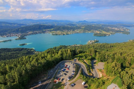 Landscape view of the Alpine lake, Woerthersee, and its parking lots in the southern Austrian state of Carinthia. Photo taken from the Pyramidenkogel Towerの写真素材