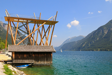 The panoramic viewing platform, Aussichtsturm, made of wood and steel at Achensee Lake Achen in Pertisau, Austriaの写真素材