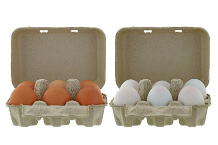 Beige paper pulp egg tray packages made of recycled paper full of fresh chicken and ducks eggs...