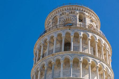 PISA, ITALY - SEPTEMBER 2016 : Tele zoom of Leaning Tower, closeup top part of world famous Pisa (Torre pendente di Pisa), freestanding bell tower campanile of cathedral in Pisa, Italy on September 22, 2016.のeditorial素材
